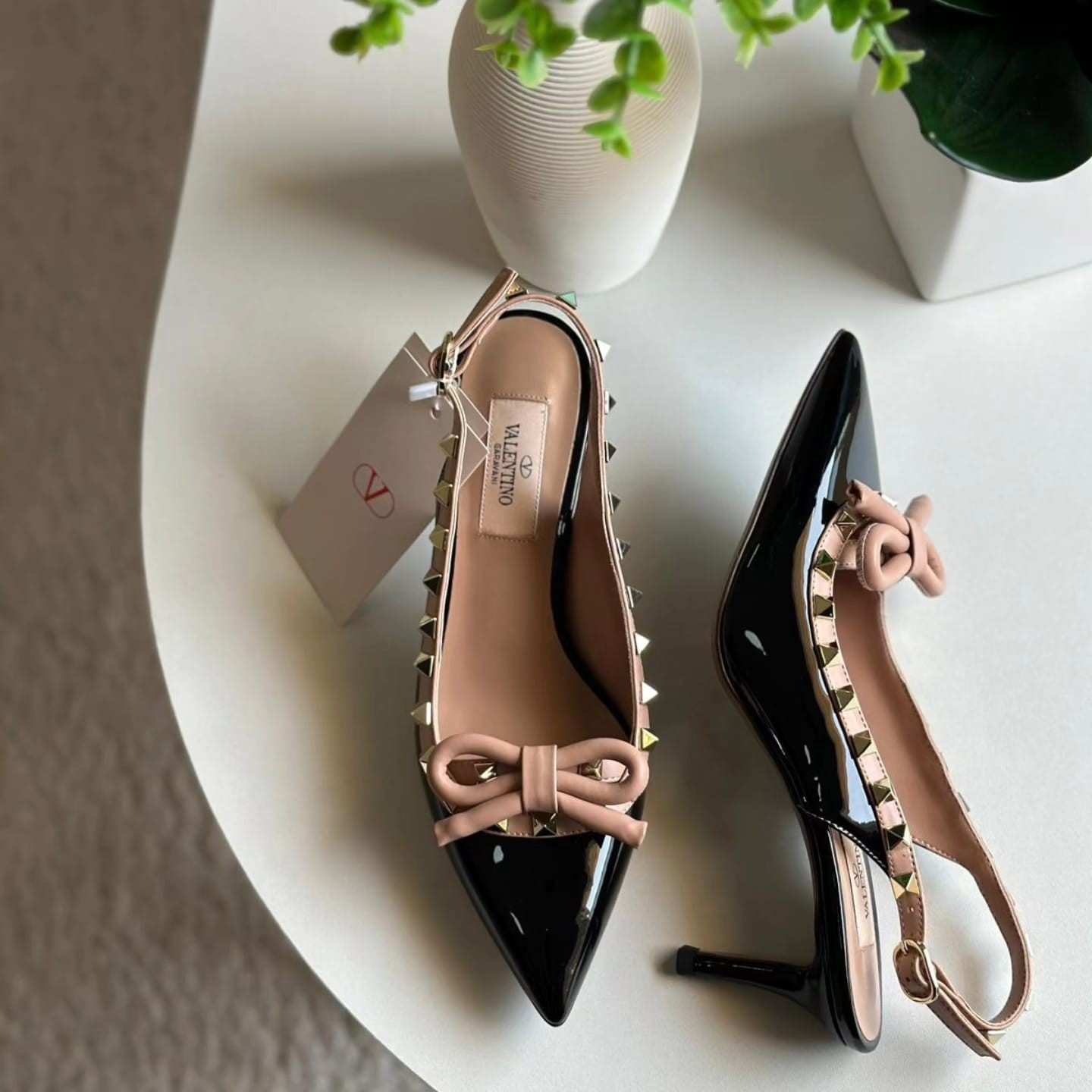 Valentino Garavani Rockstud bow slingback pumps