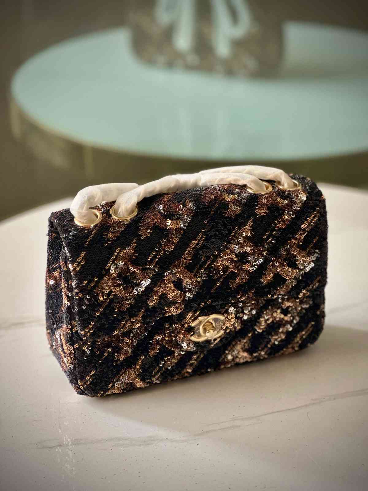 Chanel Black and Gold Sequined Flap Bag