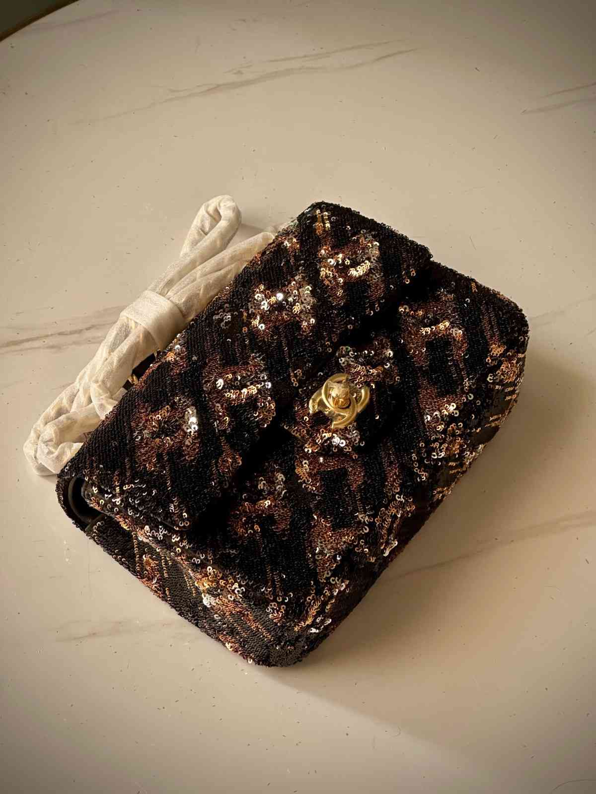 Chanel Black and Gold Sequined Flap Bag