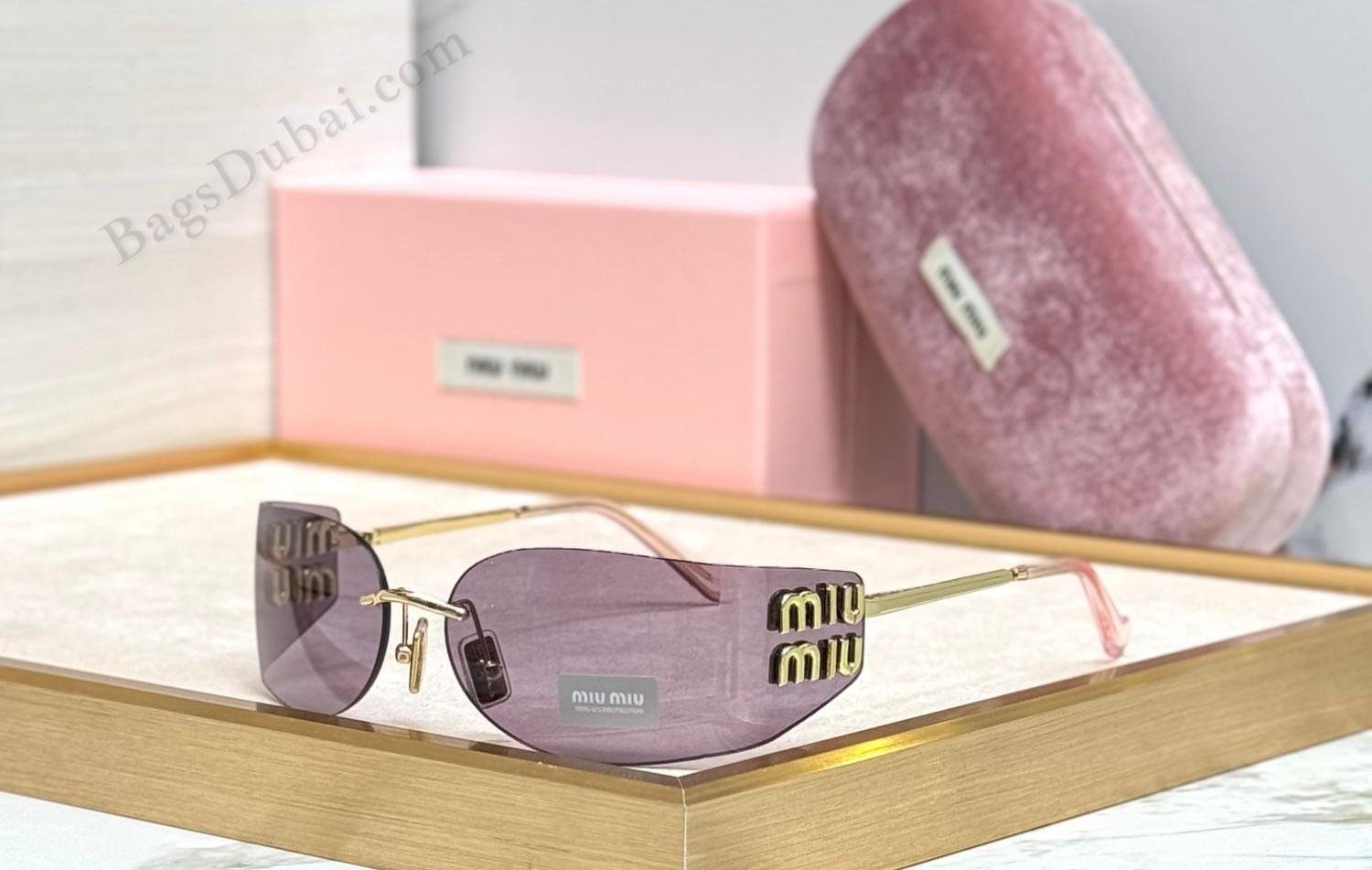 Miu Miu Women's Sunglasses Pink