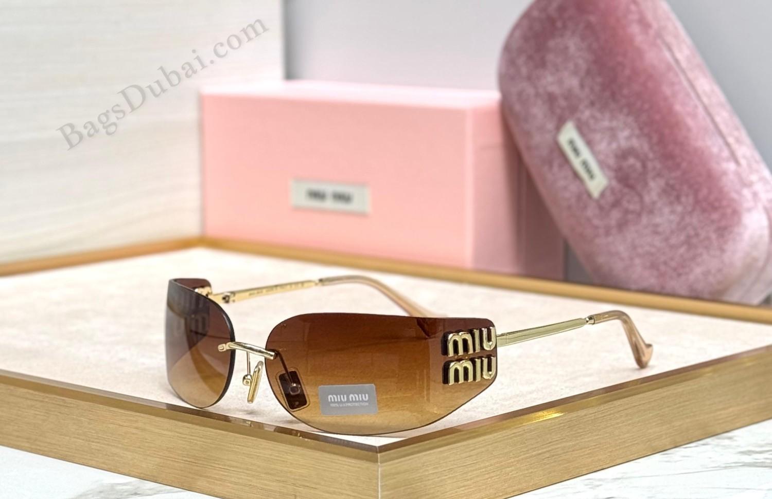 Miu Miu Women's Sunglasses Brown